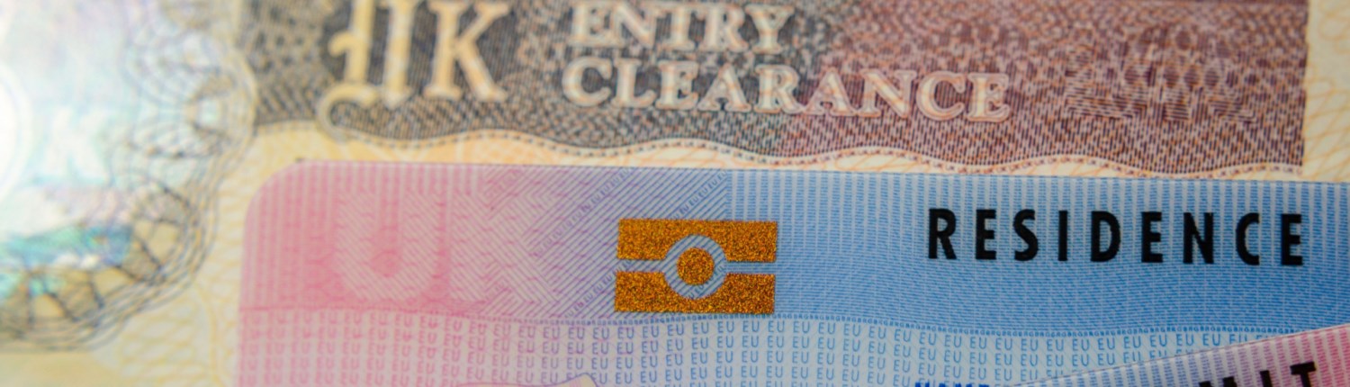 A close-up of the biometric data symbol on a UK Biometric Residence Permit